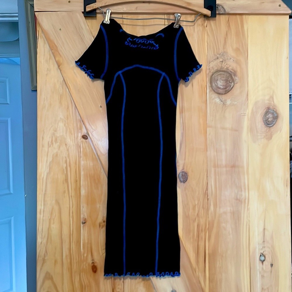 Urban Outfitter small ruffle dress with blue stitching.